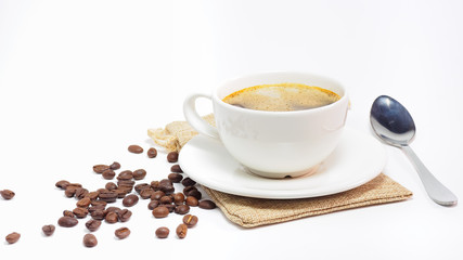 Coffee cups and roasted coffee beans, isolated on white background
