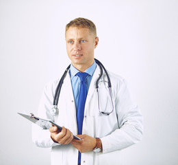Young confident doctor in a white coat with a stethoscope