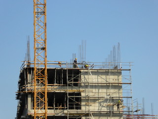 Belgrade, Serbia, 28th September 2016 - Construction building with crane and workers