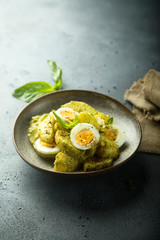 Potato salad with egg and pesto sauce