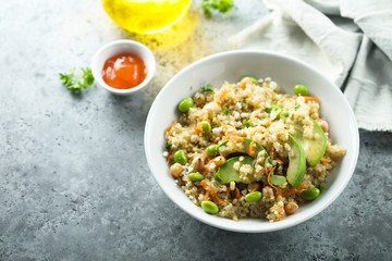 Healthy quinoa bowl with soy beans and avocado