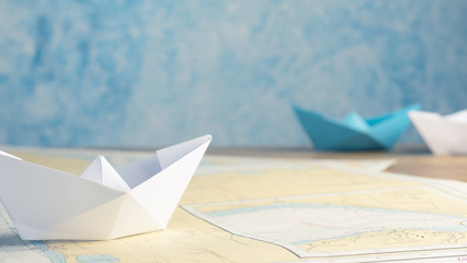 Paper boat on an office table