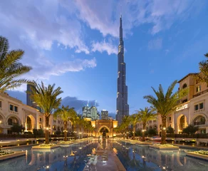 Foto auf Acrylglas Burj Khalifa Burj Khalifa and palm trees in Palace Downtown, Dubai skyline, United Arab Emirates or UAE. Financial district and business area in smart urban city. Skyscraper and high-rise buildings.