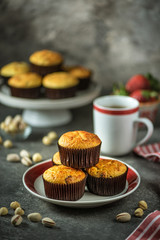 Healthy organic muffins made from cottage cheese, whole grain flour with dried cranberries. Organic baking, healthy food.