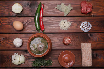 ingredients for soup on a wooden table