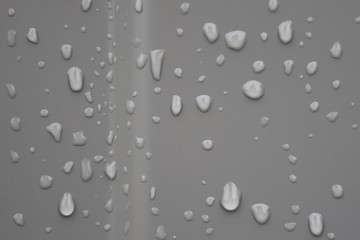 raindrops on gray metal