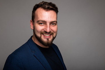 Portrait of business man wearing smart casual clothes smiling