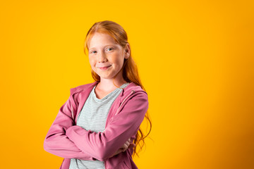 Portrait of a Beautiful Red-Haired Teenager With Copy Space