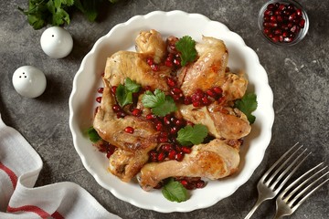 Armenian traditional chicken dish with onions, pomegranate and coriander seeds in white wine. 