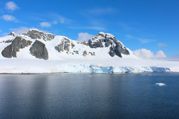 Fototapeta na wymiar Mountains of the Antarctic Peninsula. The mountains in the Gerlache Strait in the Danco Coast, Antarctica