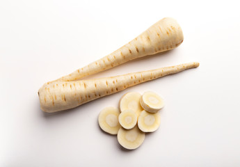 Variety of radish. Whole and slices of daikon