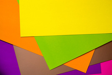 Sheets of multi-colored cardboard.