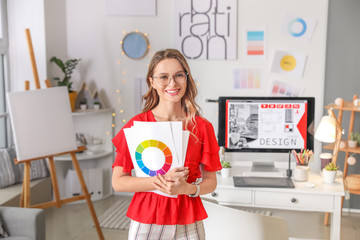 Portrait of female interior designer in office