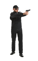 Male police officer with gun on white background