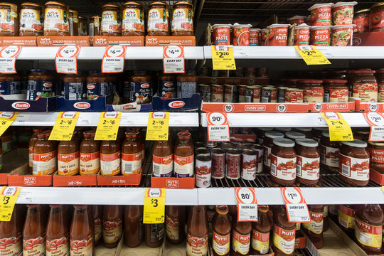 Gold Coast, Australia - May 09 2018: Italian and tomato sauces from various brands such as Barilla and Mutti are displayed in a supermarket.