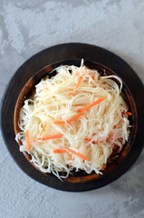 Sauerkraut in a wooden bowl. fermented vegetables