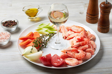 Ingredients for Shrimp Bisque Sauce. Shrimp, tomatoes, onions, carrots, celery, thyme, oil, salt, pepper, white wine.