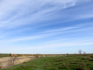 Rural landscape with blue sky and white clouds