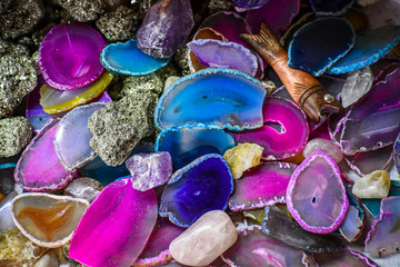 Mineral crystals and tumbled gemstones, with energy effect, in different structures and colors.