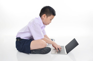 asianboy sit with laptop on the whiteblackground