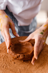 potter's wheel modeling clay women's hands mud work workshop profession hobby creativity art ceramics handwork businesswoman