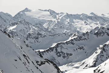 Alpine winter wonderland in Europe. Mountains in Austria in the Alps of Tyrol. Glacier Stubaier Gletscher. Perfect panorama