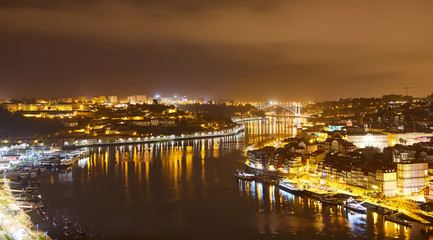Fototapeta na wymiar Porto: night panorama of Ribeira and Douro river, Portugal