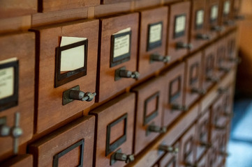 Old-fashioned library catalog with wooden drawers