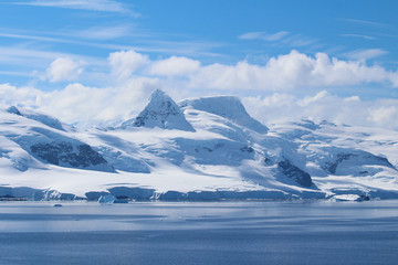 Mountains of the Antarctic Peninsula. The mountains in the Bismarck Strait at the entrance to Flandres Bay, Antarctica