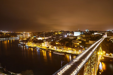 Fototapeta na wymiar Porto: night panorama of Ribeira and Douro river, Portugal
