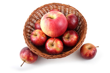 Apples on wicker plate