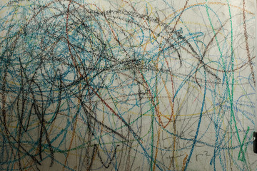 Abstract drawing with crayon on the wall