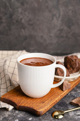 Cup of hot chocolate on grunge background