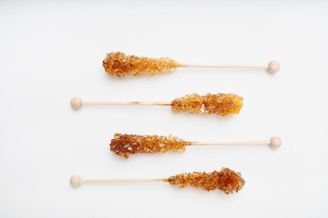Candy brown sugar on a sticks