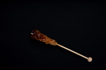 Candy brown sugar on a sticks