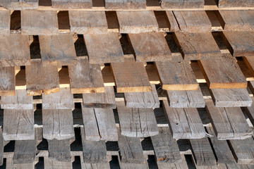 Closeup of stack of wooden pallets