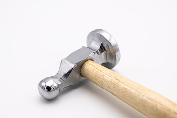 A chasing hammer lying on a white background