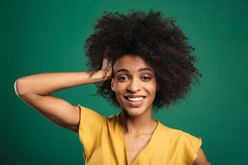 Fototapeta premium Portrait of a happy young african woman standing