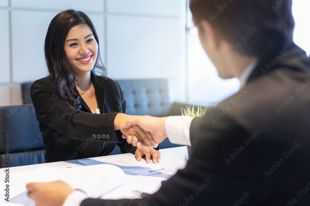 Wall mural hr manager interviewing female candidate applicant who recruit job in the office.