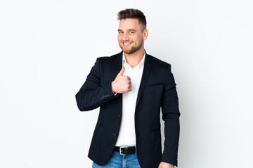 Young Russian business man isolated on white background giving a thumbs up gesture