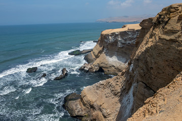 Fototapeta na wymiar Paracas national park. Peru. Ocean and desert. Playa el puente. Coastal. Rocks