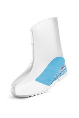 Subject shot of a white boot cut in half and with a blue half-insole inside. The height increasing insole consists of two parts. The showpiece is isolated on a white background. 