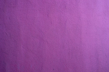 Lila purple plaster wall with a gradient background texture