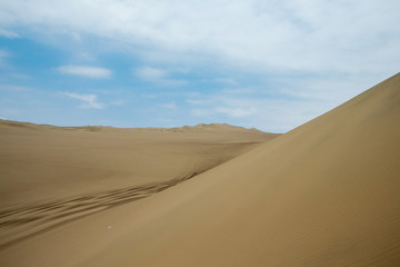 Fototapeta na wymiar Huacachina Peru. Desert. Dunes. 