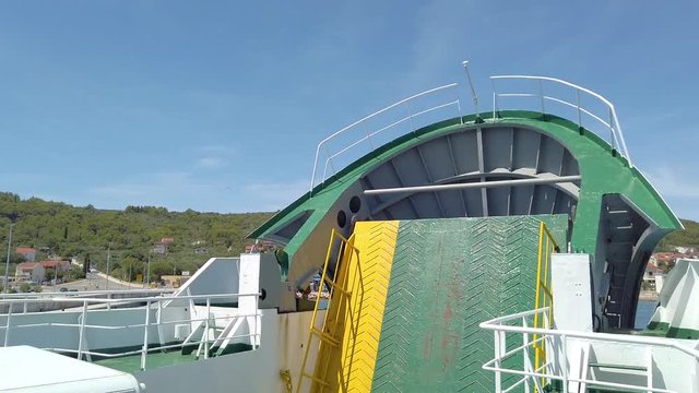 View from frerry ship with closed loading ramp leaving port. Filming beautiful adriatic surroundings while visiting Croatia.