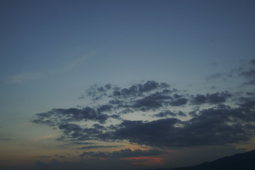 dark cloud above dusk sky