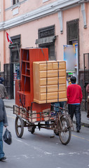 Lima Peru. Transport of furniture on a dilivery bicycle