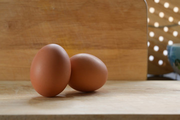 hen egg put on wood cutting board in kitchen prepare cooking