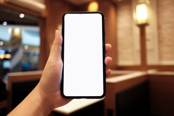 Women's hands holding cell telephone watching social media in a smart phone. social network concept with smart phone