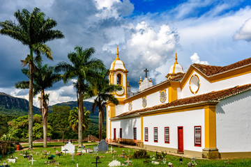 Old cemetery and garden next to an old and historic colonial church built in the 18th century in the city of Tiradentes, Minas Gerais, Brazil
